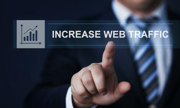 Generate Website Traffic businessman pressing button virtual screens