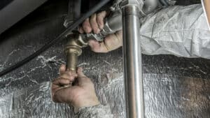 Image of a plumber working in New York